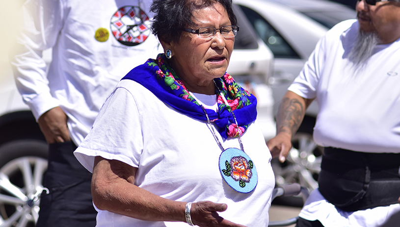 Ute elder Thelma Whiskers addresses the crowd at the annual spiritual walk to protest the mill in 2019.