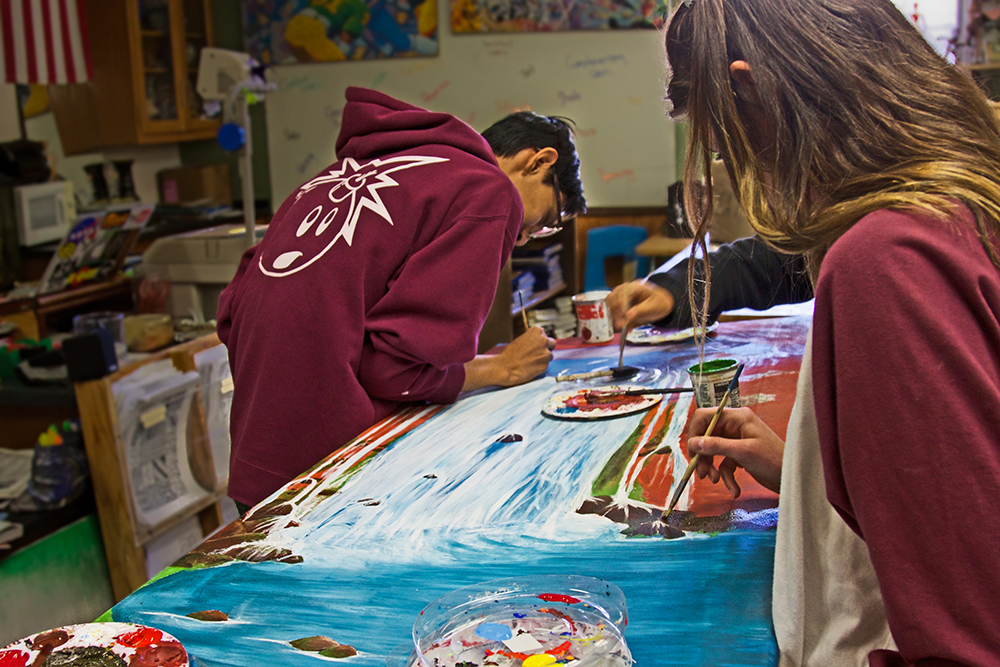 Young people working on art project