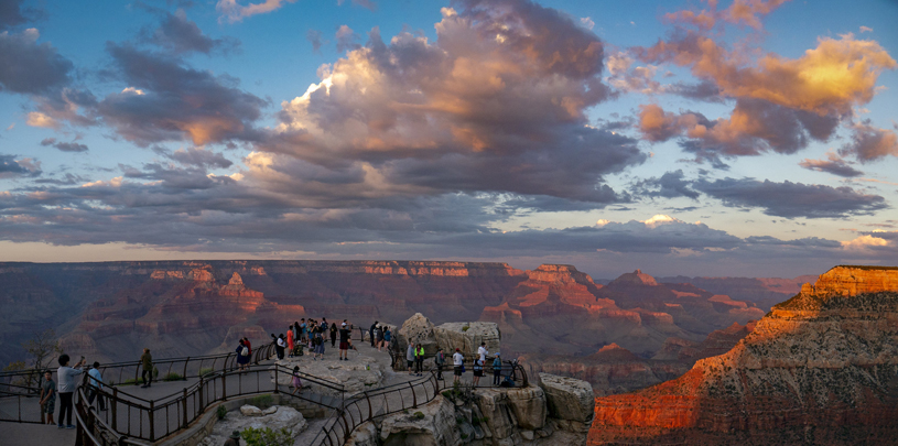 Visitors take in the view at Mather Point.