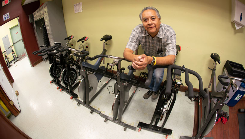 Samuel Shingoitewa has found his calling repairing fitness equipment in reservation communities. Photo by Jake Hoyungowa