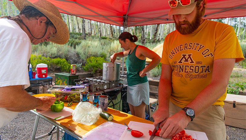 Cooking dinner after a productive day in the field.