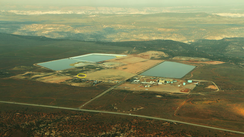 The White Mesa Mill, seen from the air. The main pilot area for testing the proposed cleanup plan at the mill is circled. ECOFLIGHT