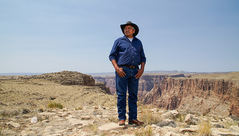 Navajo rancher Franklin Martin stands above the Little Colorado River