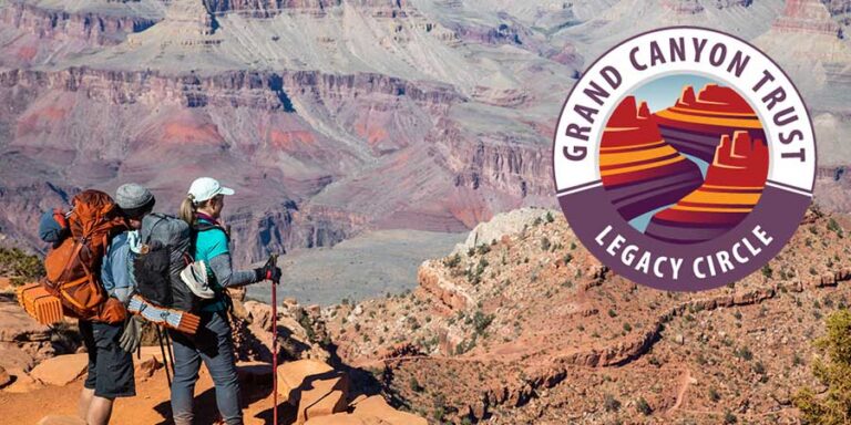Two hikers with backpacks look out over the rocky landscape of the Grand Canyon; a “Grand Canyon Trust Legacy Circle” logo is displayed on the right, highlighting how Retirement Plan Gifts can help preserve these awe-inspiring views for future generations.
