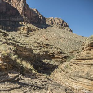 A view of the green shale of the Tonto Platform and the Redwall cliffs above it.
