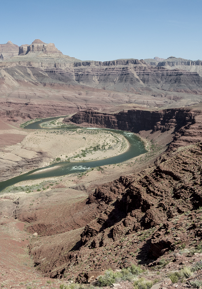 A view of the "furnace flats" of the Grand Canyon with wide, colorful views