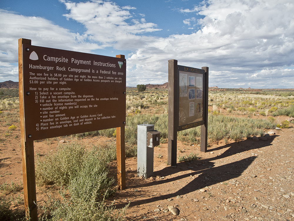Two Bureau of Land Management signs explaining rules of Hamburger Rock Campground