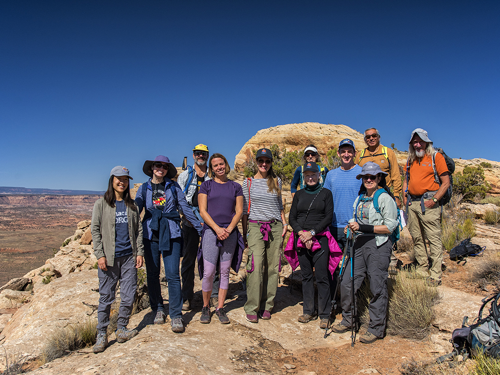 Trust donors pose on slickrock in Bears Ears National Monument.