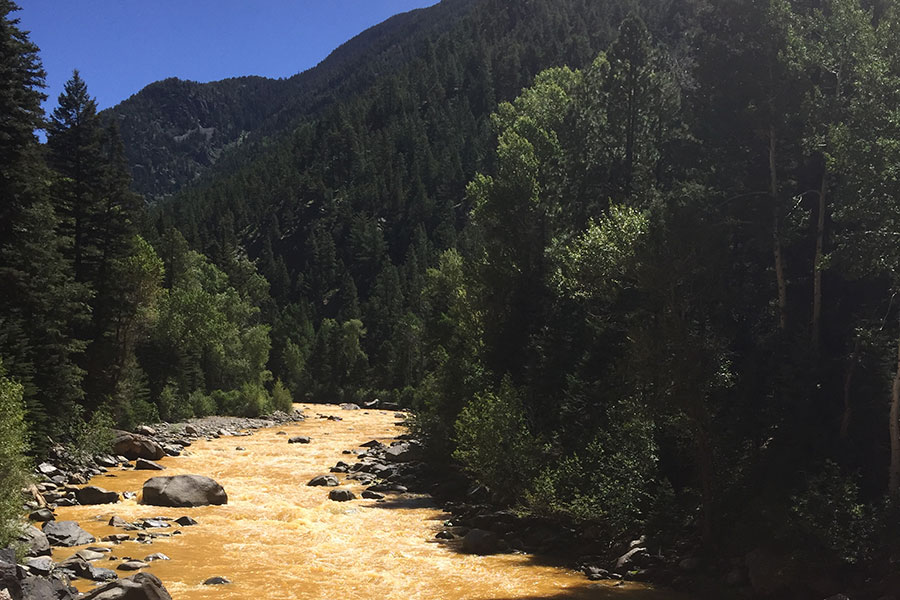 The Animas River turns yellow after the Gold King Mine spill in 2015