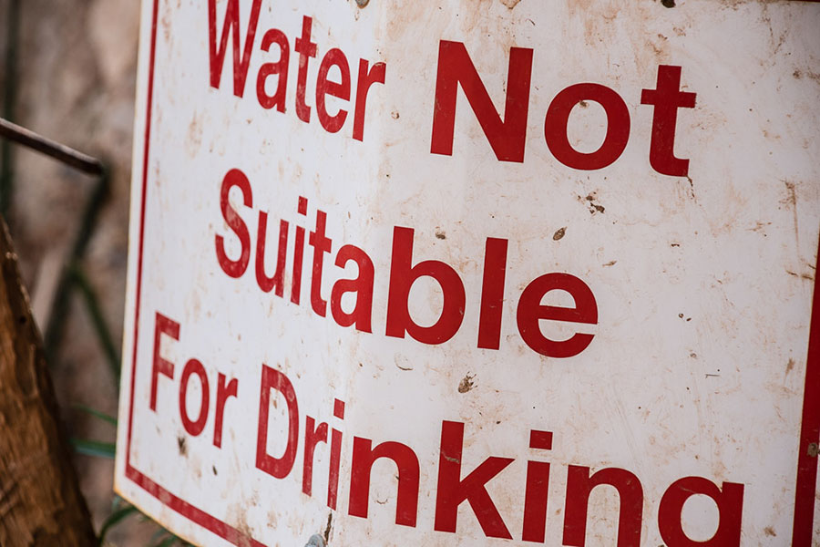 A sign says "water not suitable for drinking."