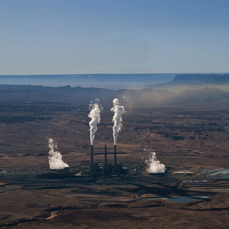 Navajo Generating Station's three towers billowing steam